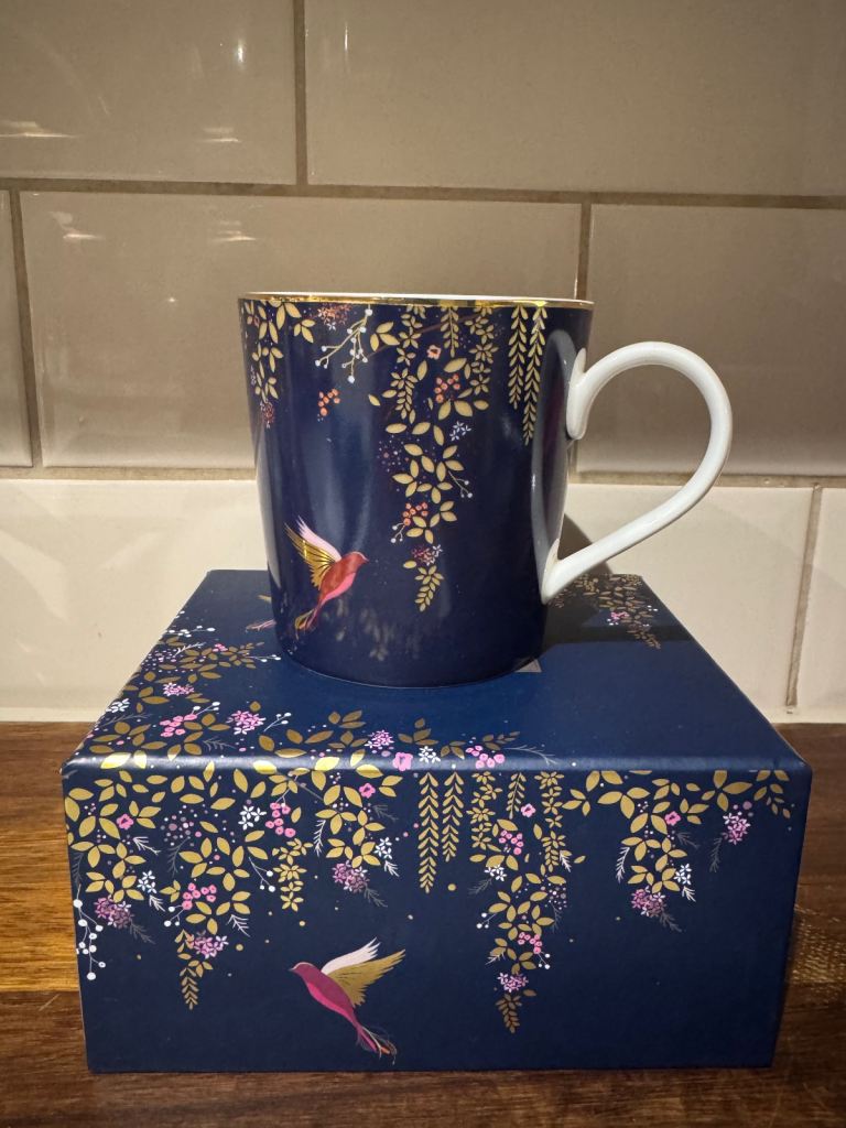 Sara Miller London Chelsea Collection mug, navy, featuring a hummingbird design