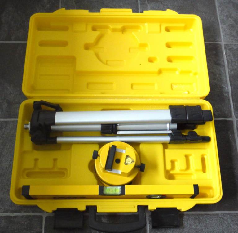 Lazer dumpy level with tripod new in its case. Laser brand, see photos