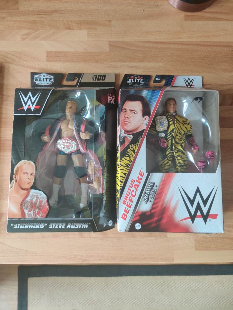 WWE Elite action figures for sale Stunning Steve Austin and Brutus the Barber Beefcake.