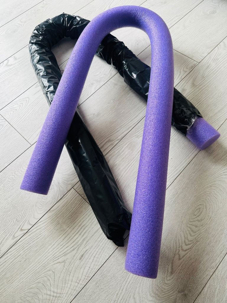 A pair of Purple Swimming Noodles -New