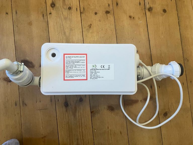 Shower macerator pump