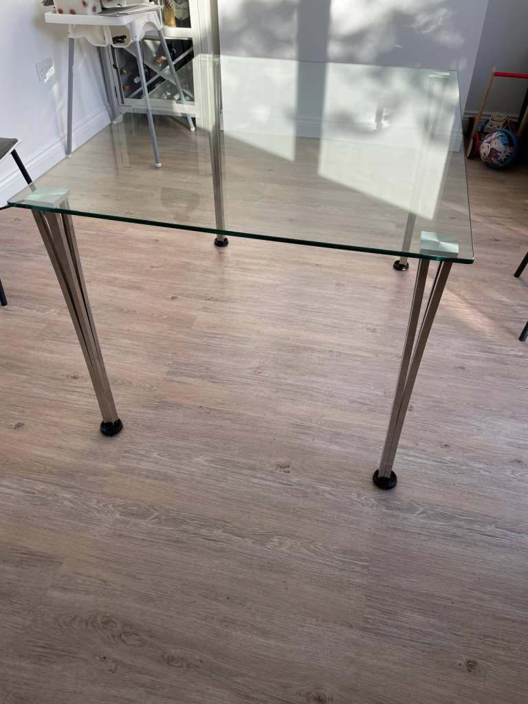 Stunning glass dining table - without chairs