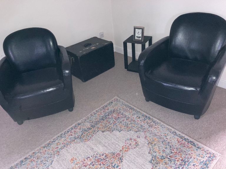 Pair of Black Leather Armchairs – Good Condition