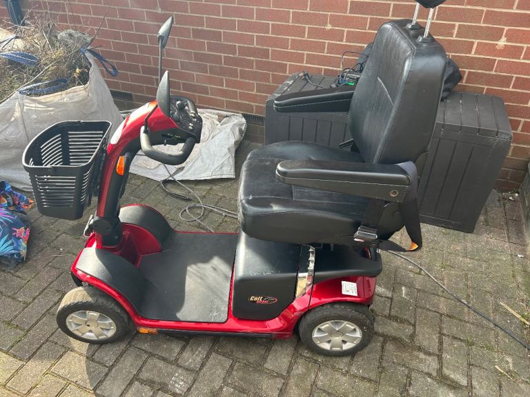 Red Colt Deluxe Electric Mobility Scooter. Also a wheelchair. 