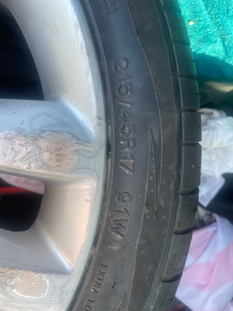 alloy wheels with new tyres (four)
