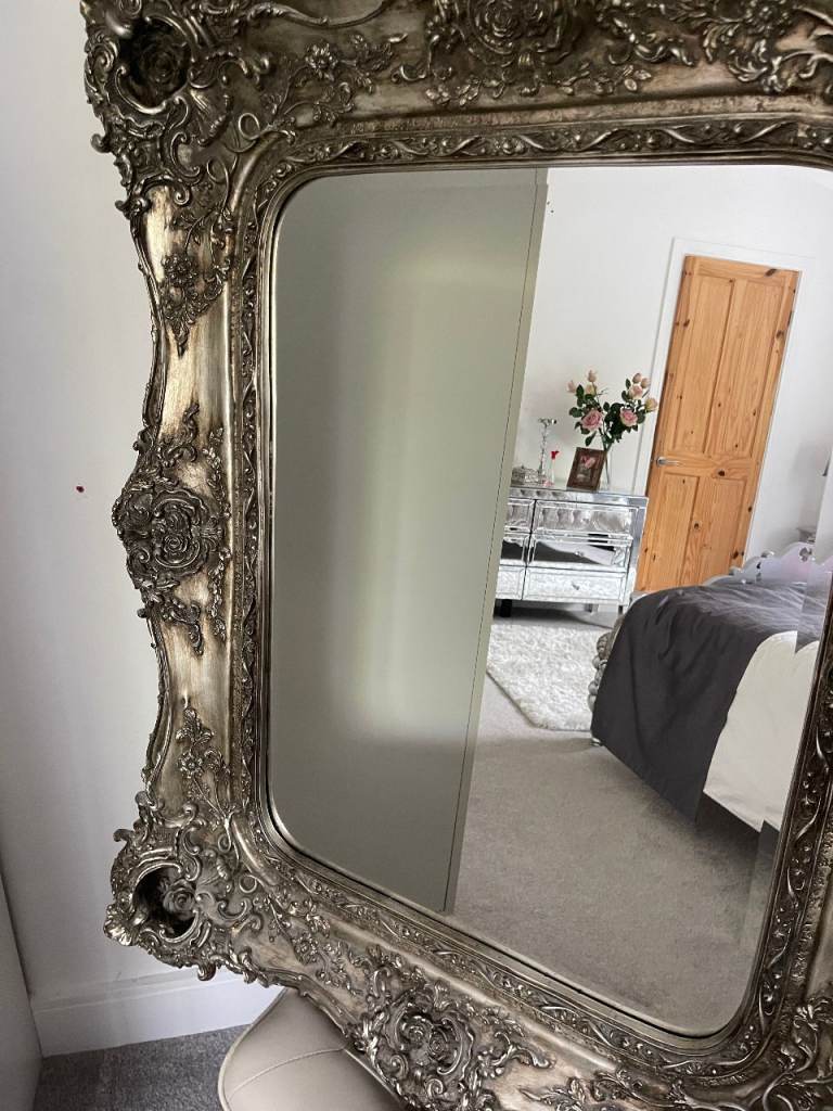Large ornate pewter mirror