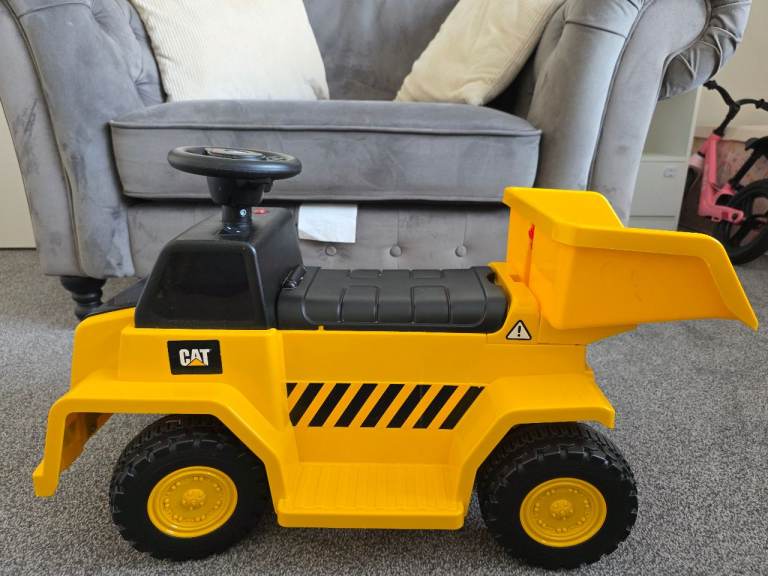 CAT Ride-On Dumper Truck Toy – Yellow, Good Condition