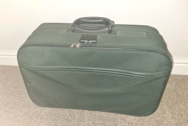 Quality Samsonite small to medium suitcase with handle and wheels