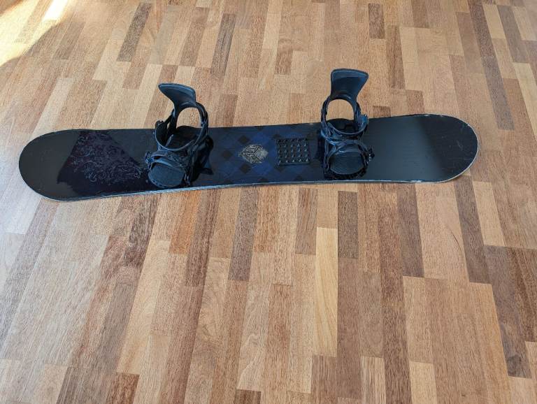 K2 Zeppelin Snowboard with Salomon bindings.