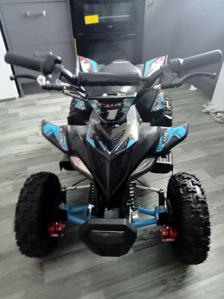 EXCITE Kids Electric Quad Bike – Black and Blue, Good Condition