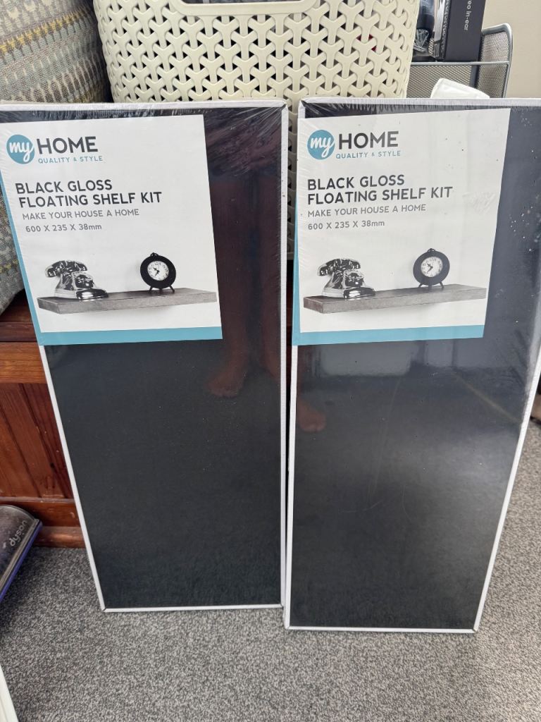 Pair of black floating shelves