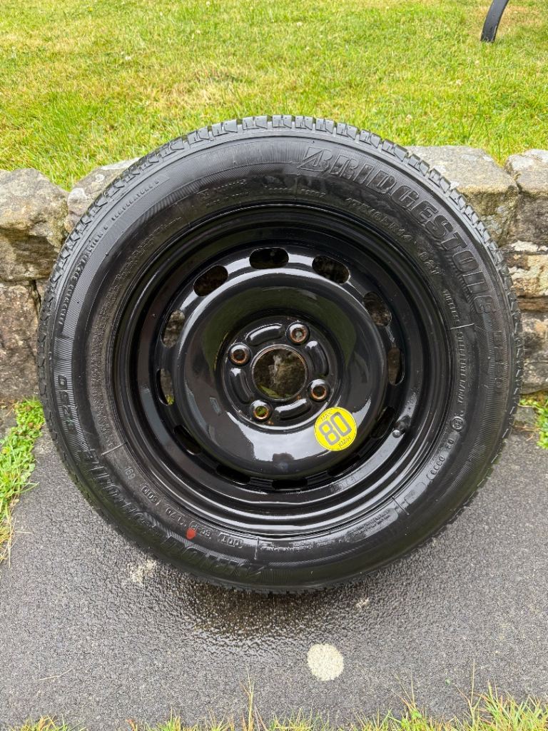 Car spare wheel with New Bridgestone tyre 