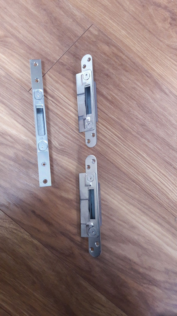 Composite door slam lock mechanism 