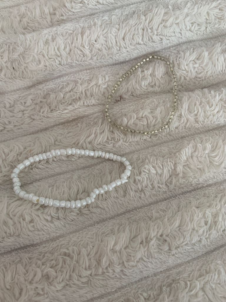 White Beaded Bracelet and Silver-Tone Bracelet – Good Condition