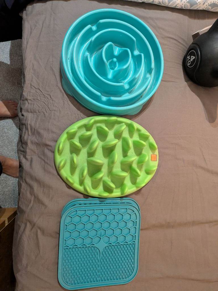 2 large slow eating dog bowls and 2 licky mats