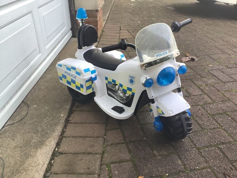 KIDS ELECTRIC MOTORBIKE SCOOTER( no charger)