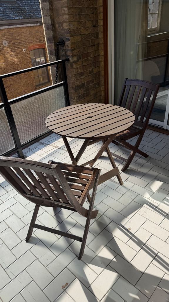 Fold up wooden outdoor table and chairs