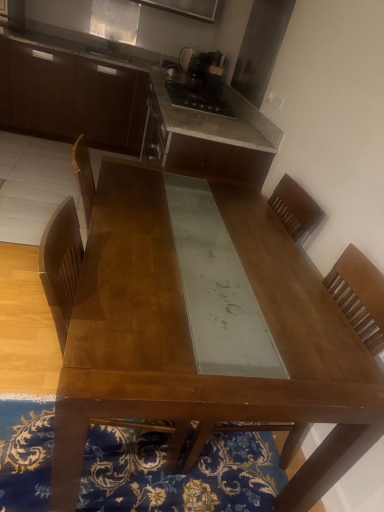 Wood Dining table with 4 Dining seats with matching coffee table – Good Condition