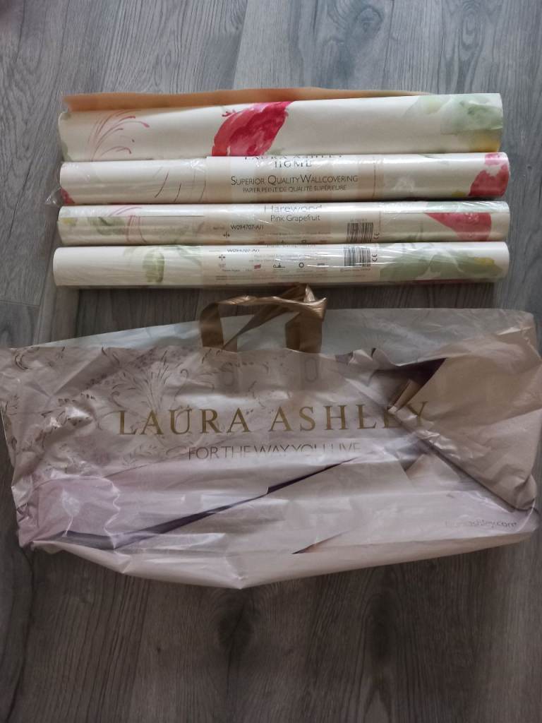 New Laura Ashley pink grapefruit wallpaper.  3 new rolls. 1 partial roll.  Buyer to collect.
