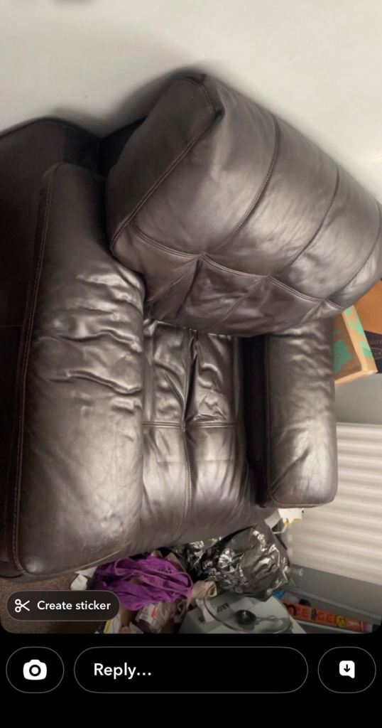  Brown faux leather  armchair