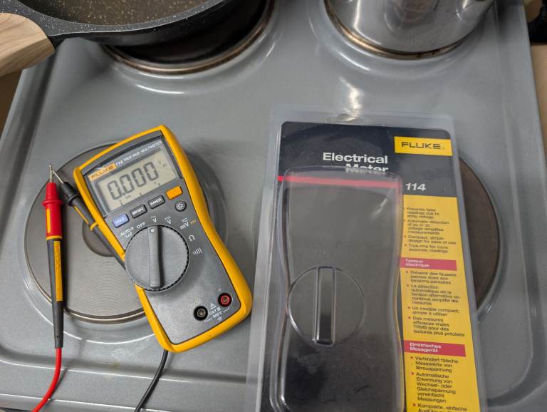 Fluke multi meter with leads plus separate fluke 35 pound adjustable leads