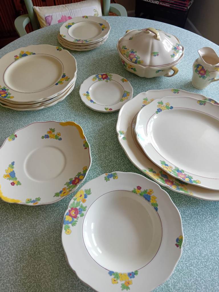 Royal Doulton dinner plates,  side plates, platters, soup bowls,  tureen and jug for sale. 