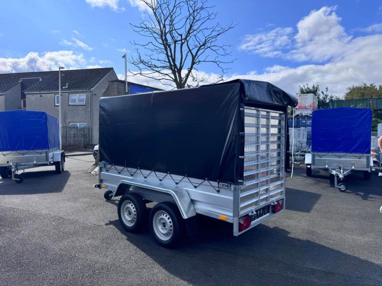 BRAND NEW 8,7ft x 4,2ft TWIN AXLE TRAILER WITH 150CM FRAME COVER AND RAMP 7500KG UN BARKED