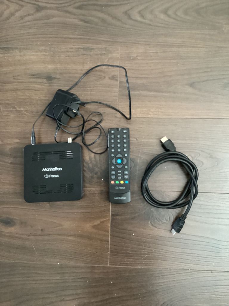 Manhattan Freesat Box with Remote and Cables – Good Condition