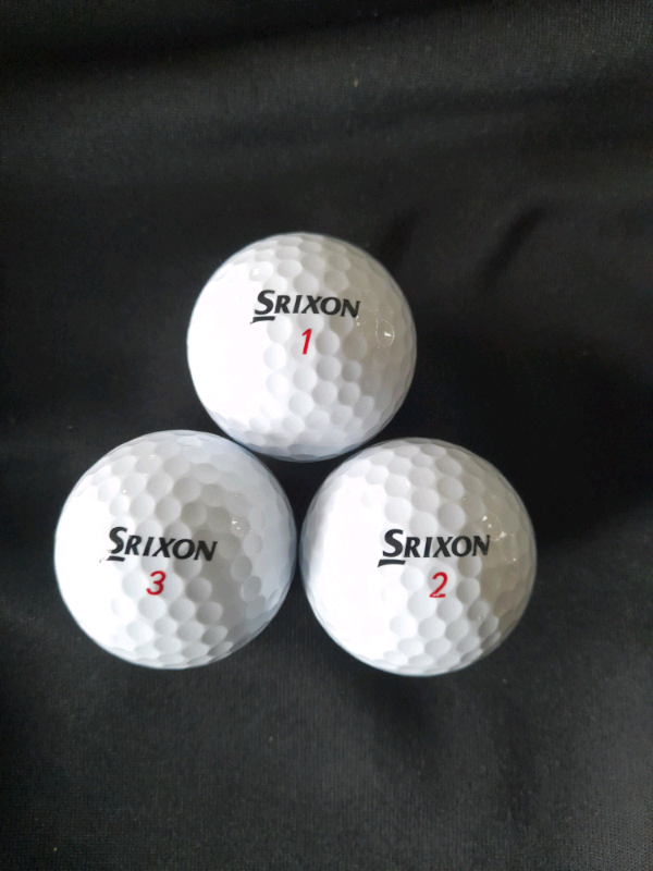 24 Used Srixon Distance Golf Balls. 
