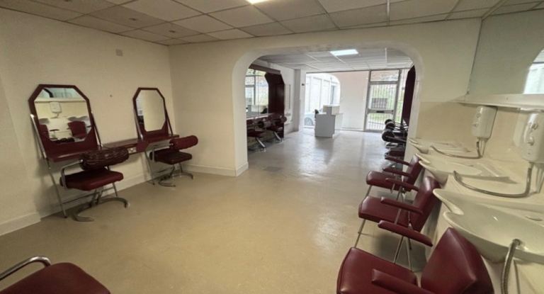 Ground floor retail unit for rent - versatile open space, currently fitted out as hair salon