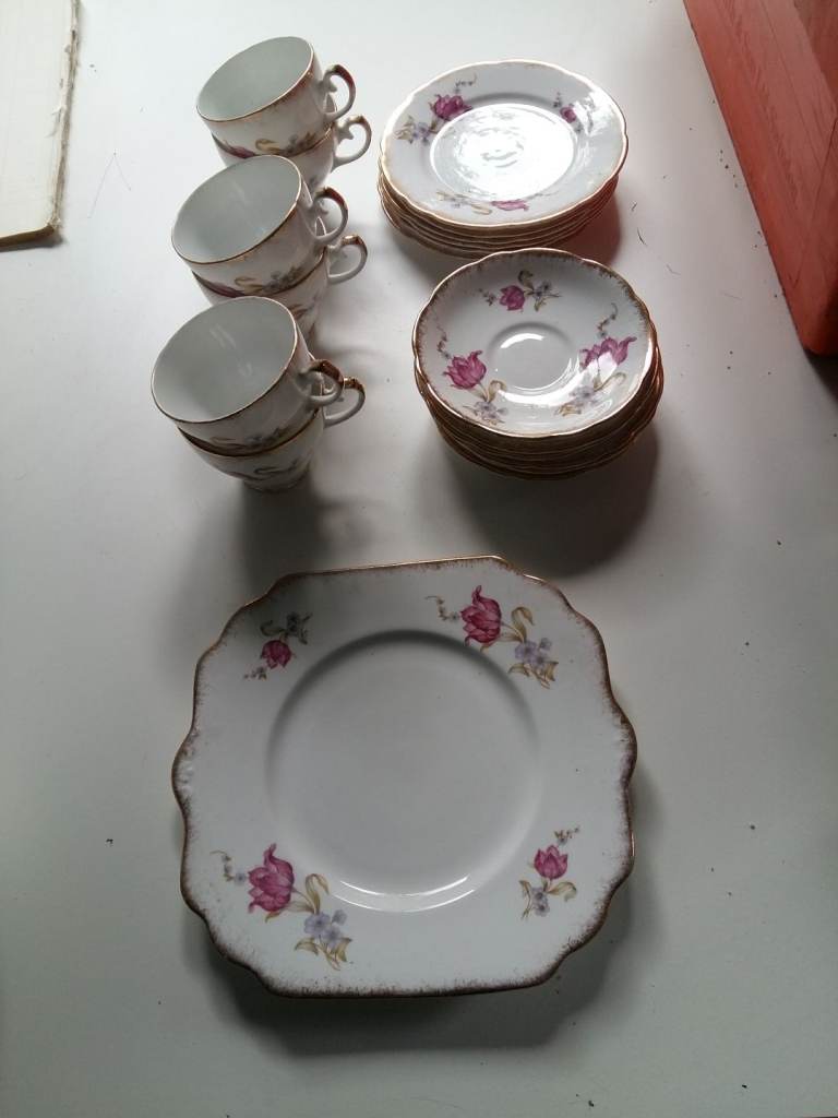 Cups, Saucers, plates and cake plate (19 piece), Bone China.
