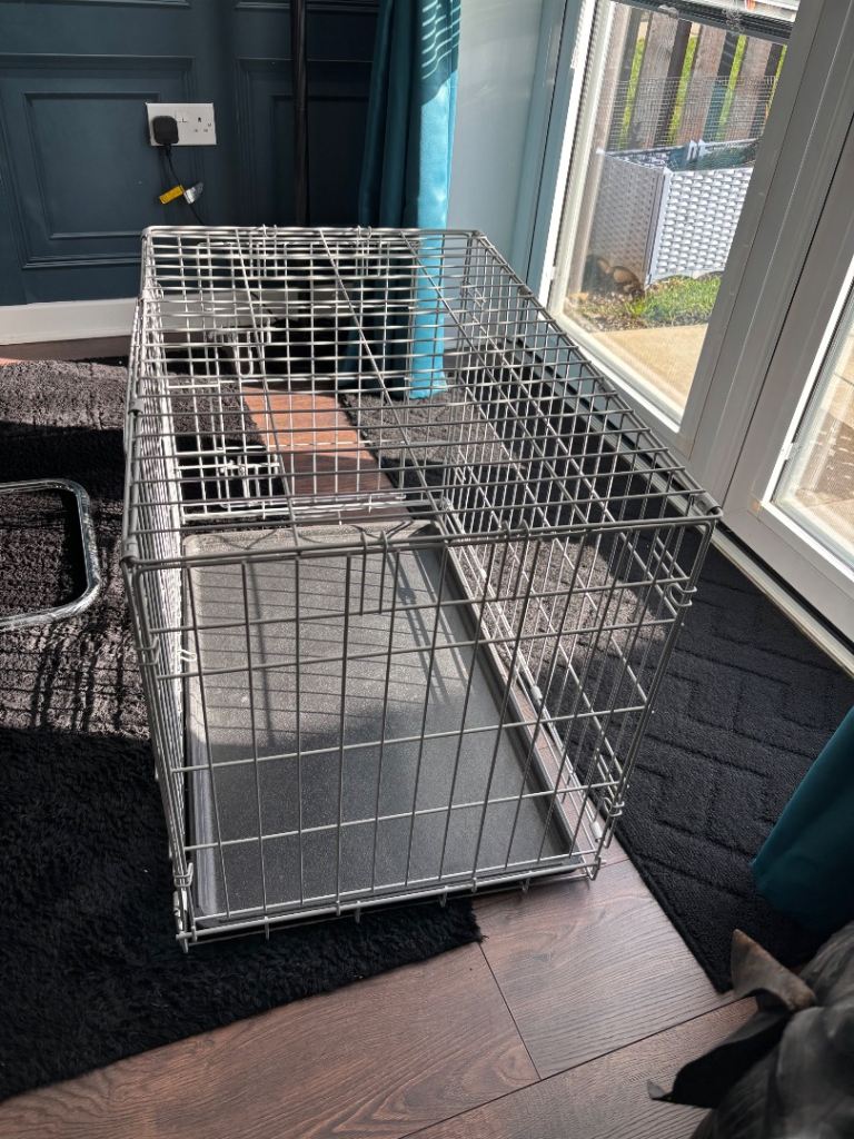Medium dog crate for sale. 