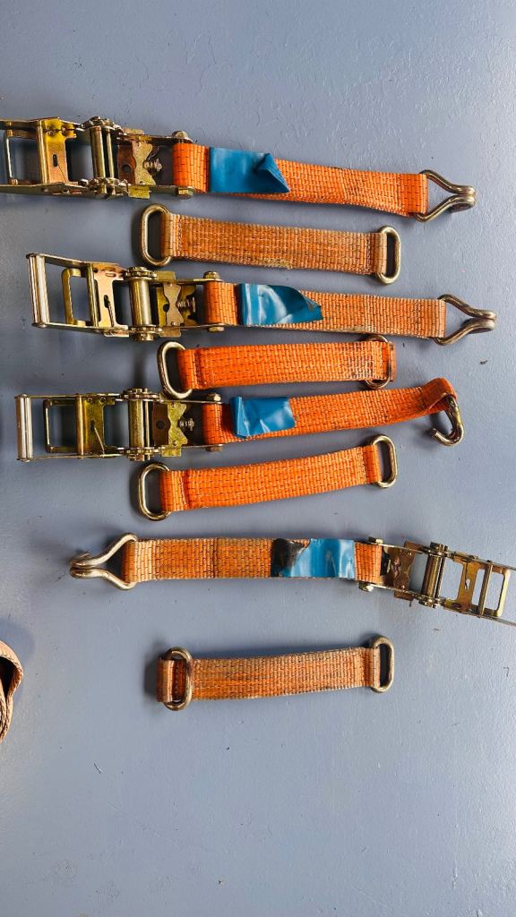 Car trailer ratchet straps. Wheel restraints