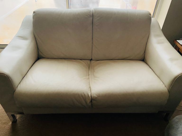 Used 2 seater faux leather sofa 