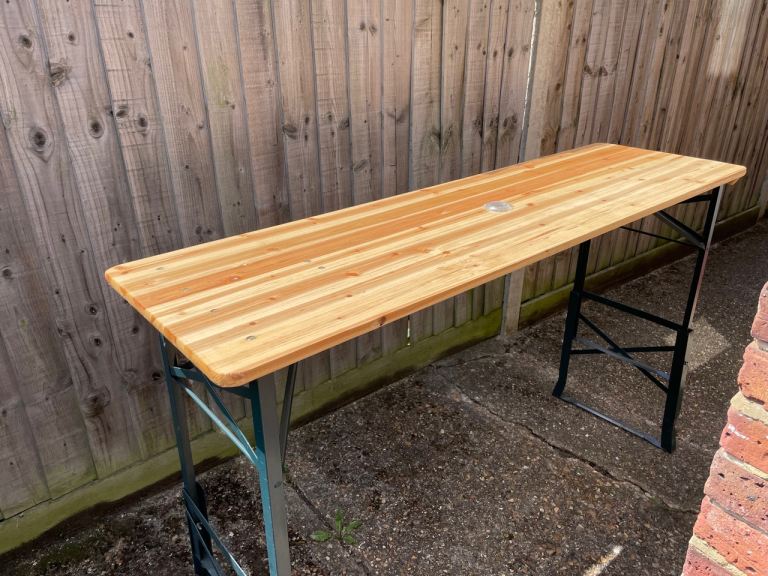 indoor / outdoor height adjustable table folds flat