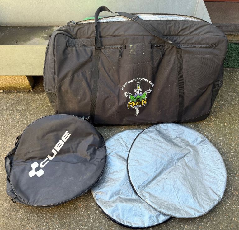 image for 1x bike and 2x wheel padded transport bags, cycle storage, £30 the lot