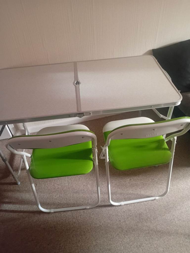 Fold up table and fold up chairs 