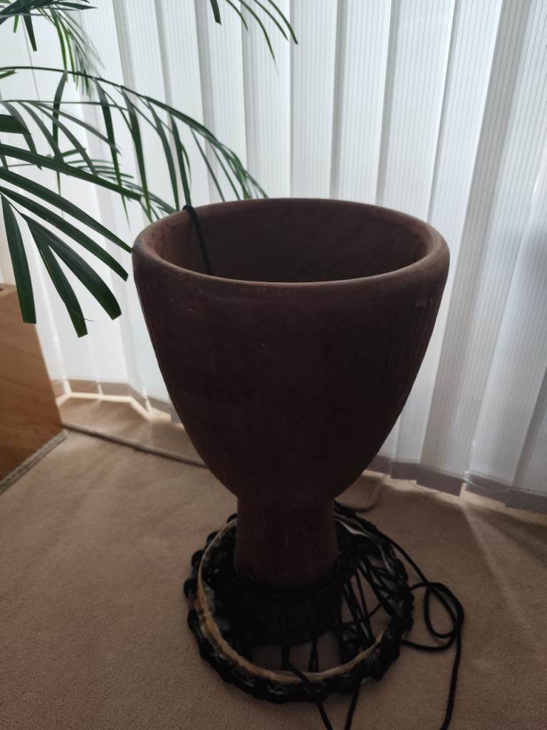 Vintage African hand carved wooden djembe drum
