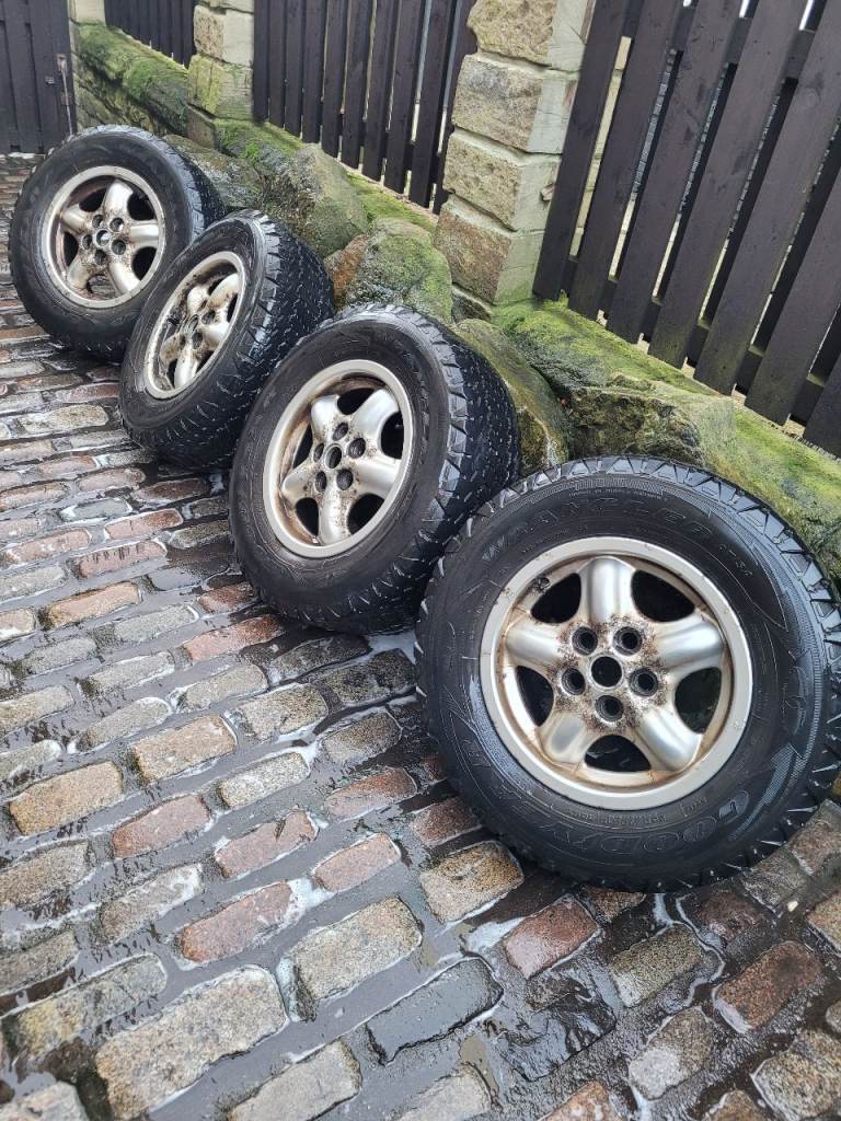 4x classic Range Rover P38 16inch alloys with 4 ok matching goodyear wrangler tyres size 235 70 16 
