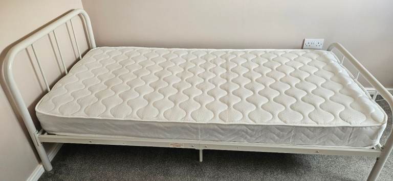 Single metal bed frame and mattress