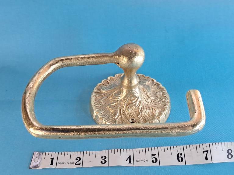 Luxe Gold  tone toilet roll holder with a decorative backplate. ( no brass).