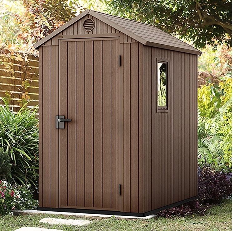 Keter Darwin plastic shed.New and never put together.Extra treated wooden base.Bargain £250