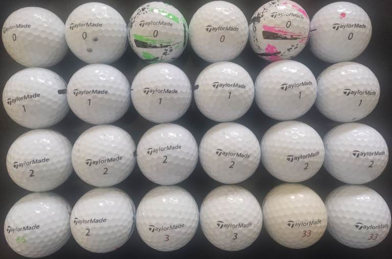 24 TaylorMade golf balls.