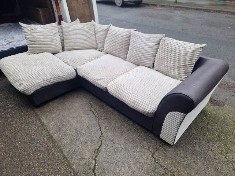Beige corner sofa. Good Condition. No Cost Home Delivery 