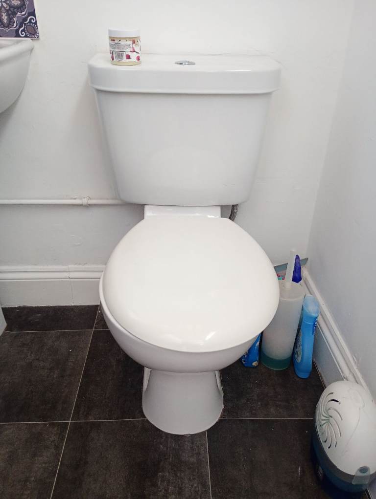 White Ceramic Toilet and Basin Set – Good Condition