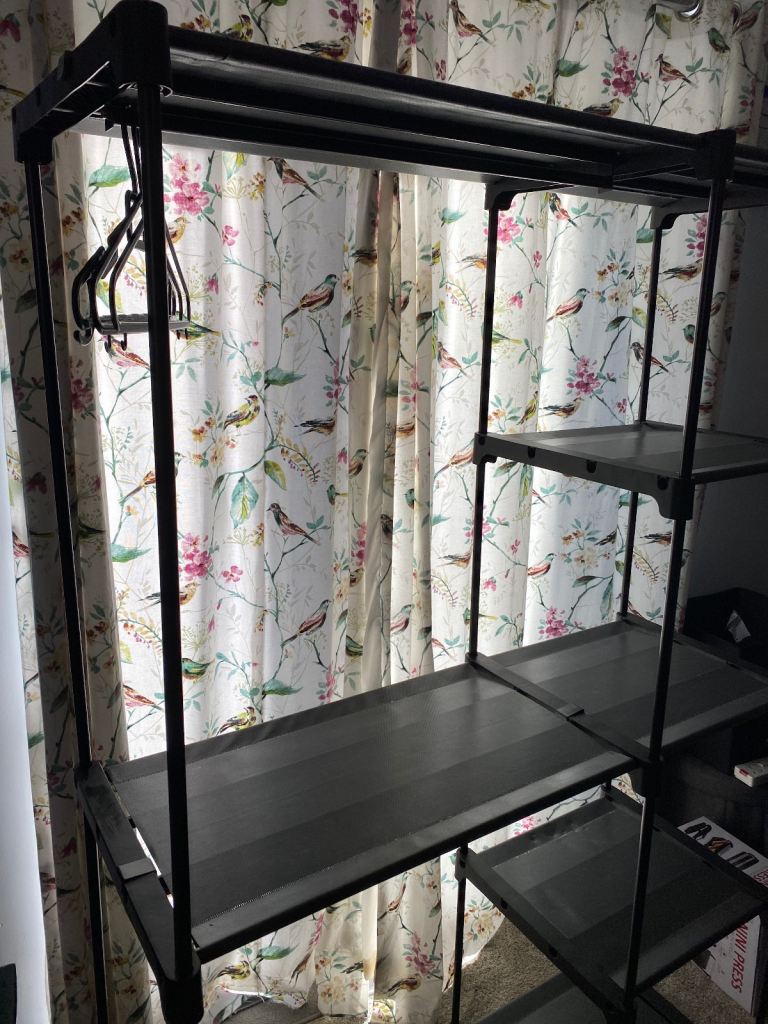 Open freestanding wardrobe clothes rail