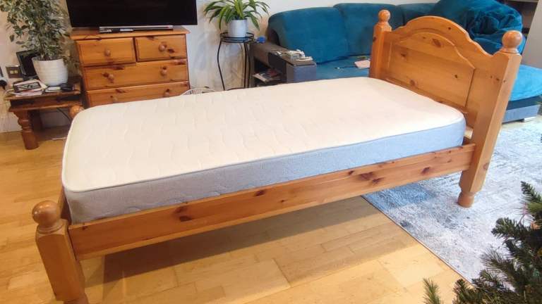 Pine single bed with 6 month old mattress.