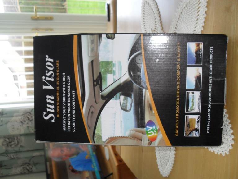 new clip on sunvisor clips onto existing sunvisor