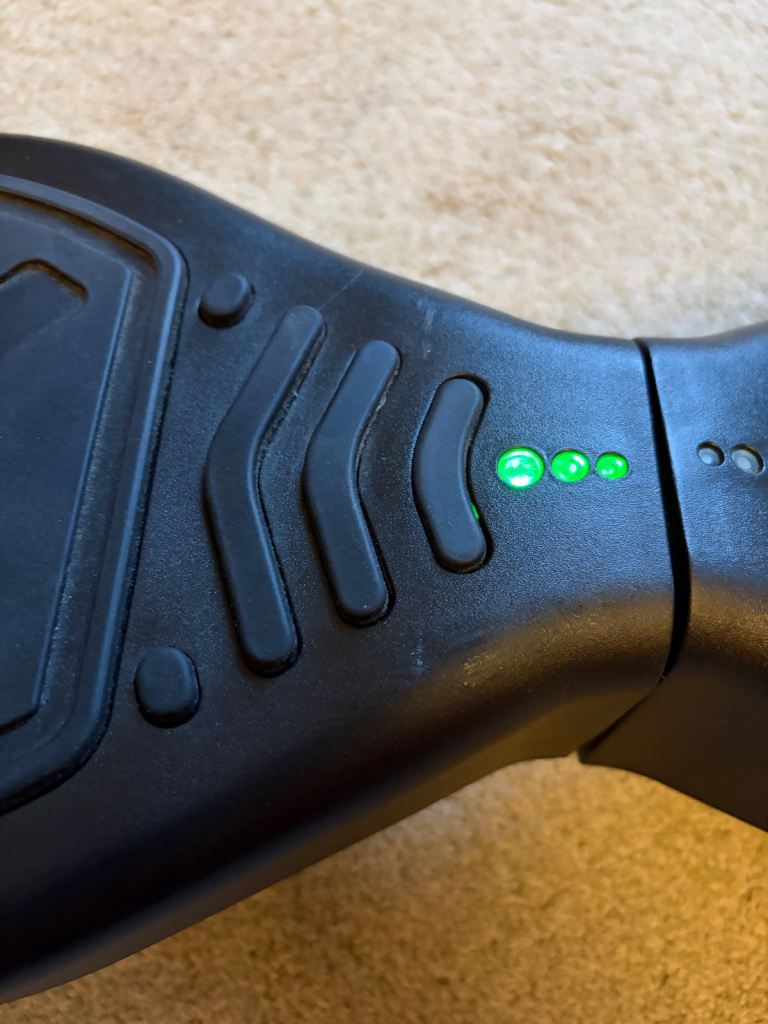 Hoverboard in excellent condition, plus charger and safety accessories 