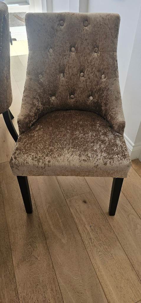 A set of 10 dining chairs